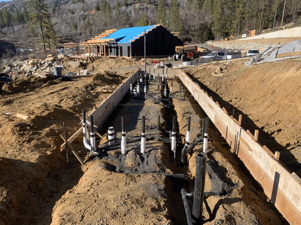 Commercial plumbing rough-in for new construction foundation in Tuolumne County