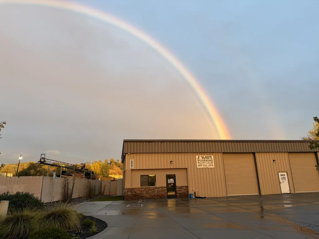 J. Hart Plumbing office in Sonora with rainbow