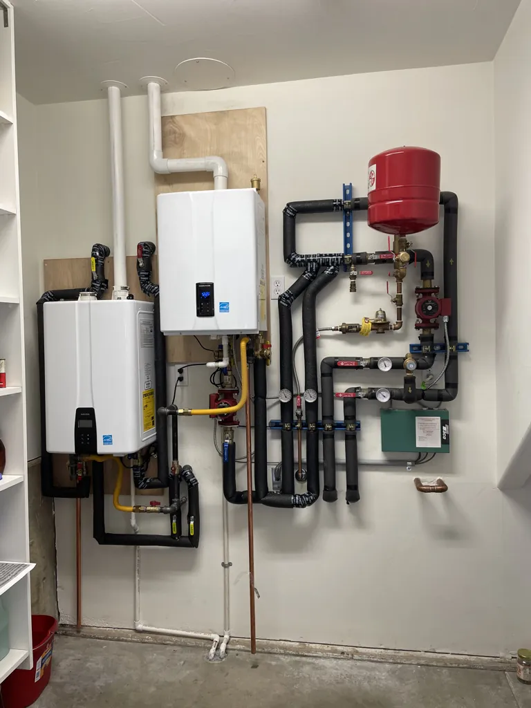 Tankless water heater and radiant heating system installation by J. Hart Plumbing